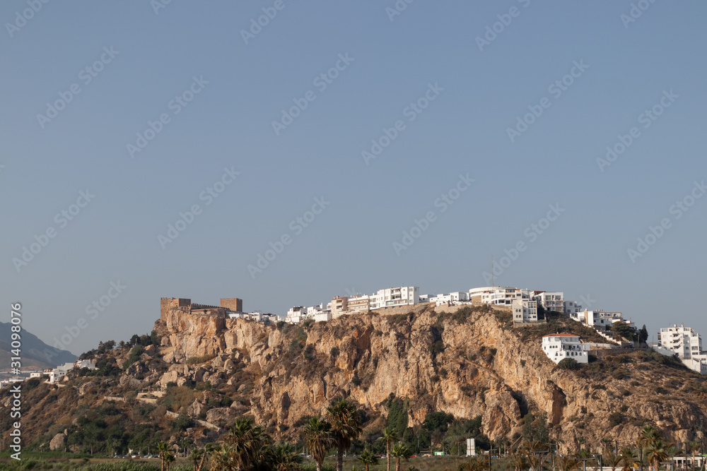 Castle and village in the top of the rocky mountain (Salobreña, Granada, Spain)