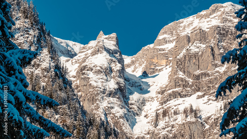 Beautiful winter wonderland at the famous Klausbachtal, Hintersee, Ramsau, Berchtesgaden, Bavaria, Germany photo