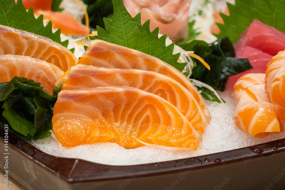 Raw salmon sashimi slice on ice Japanese food Raw salmon sashimi slice on ice Japanese food