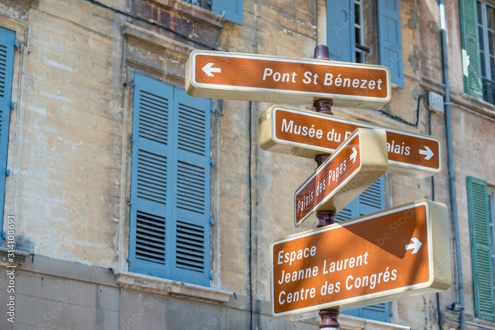 Historic city center of Avignon with directions to tourist attractions including Palace of Popes, Provence, France Historic city center of Avignon with directions to tourist attractions including Palace of Popes, Provence, France