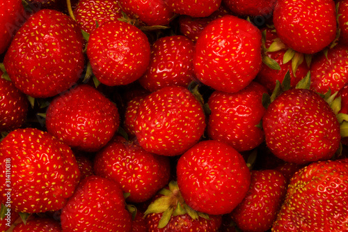 Ripe strawberries closeup. Background, textures
