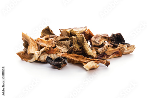 Heap of dried homemade mushrooms isolated on a white background in close-up.
