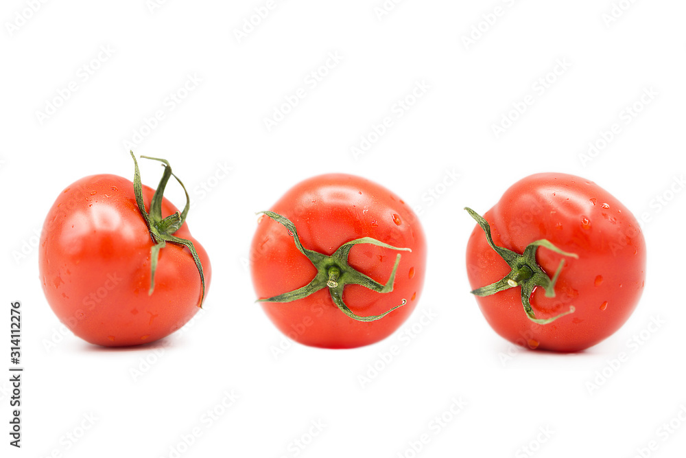 ripe fresh organic tomatoes in drops of water Isolated on a white background ripe fresh organic tomatoes in drops of water Isolated on a white background