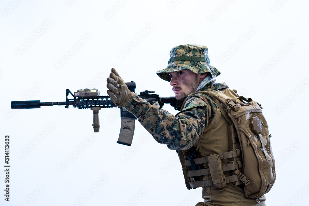 Fototapeta premium soldier in action aiming laseer sight optics