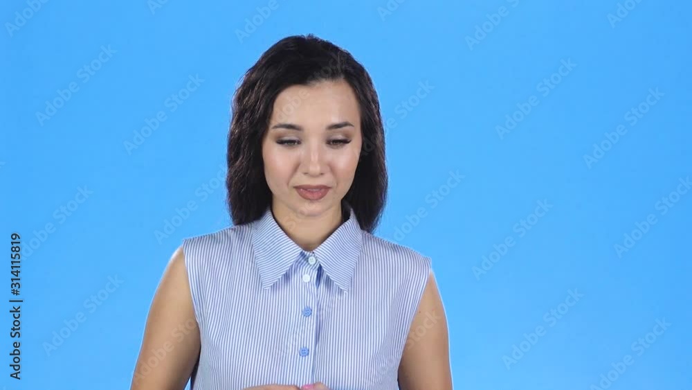 Young lady is telling something and gesticulating. Slow motion Young lady is telling something and gesticulating. Slow motion