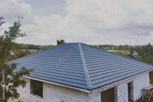 Wallpaper Mural Corrugated metal roof and metal roofing. Modern roof made of met Torontodigital.ca