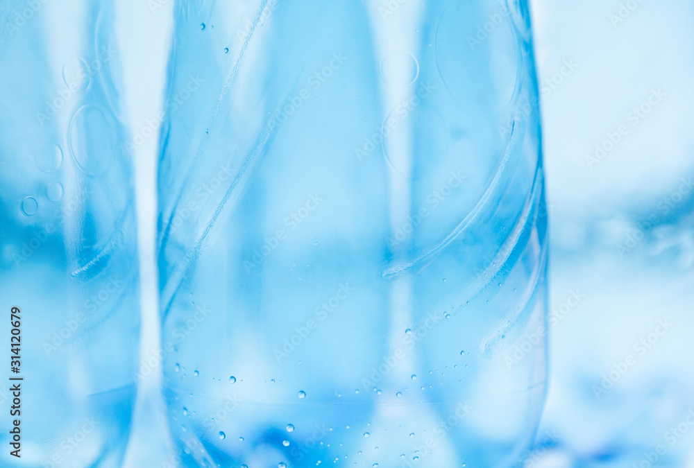 Empty plastic bottles in macro shot on white background Empty plastic bottles in macro shot on white background