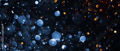 abstract bokeh background, colorful particles