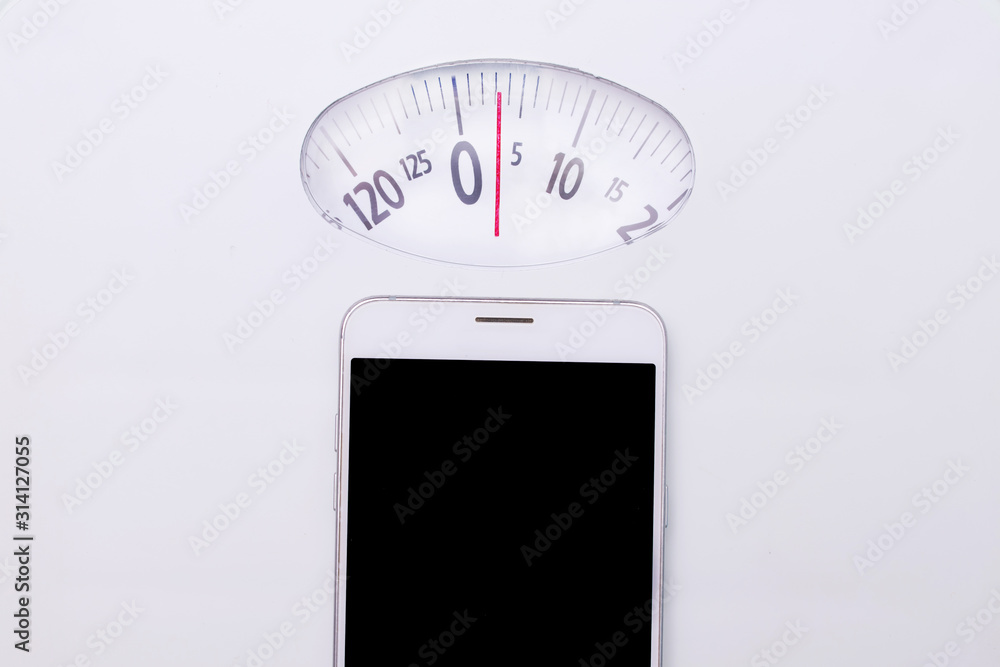 scale background with mobile phone scale background with mobile phone