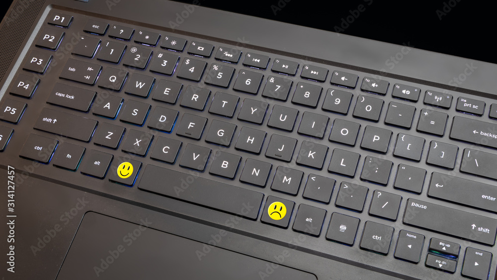 computer keyboard with imaginary emoticon keys