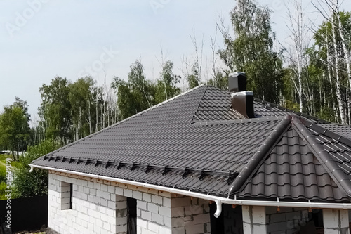 Wallpaper Mural Corrugated metal roof and metal roofing. Modern roof made of met Torontodigital.ca