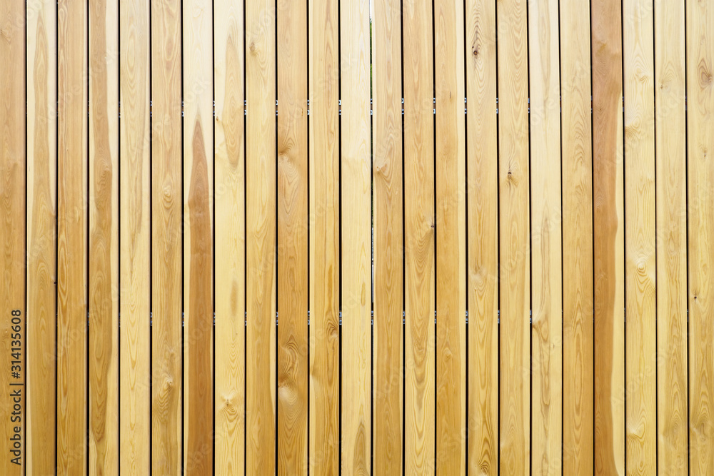 Fototapeta premium Wooden planks vertical backdrop, natural textured background