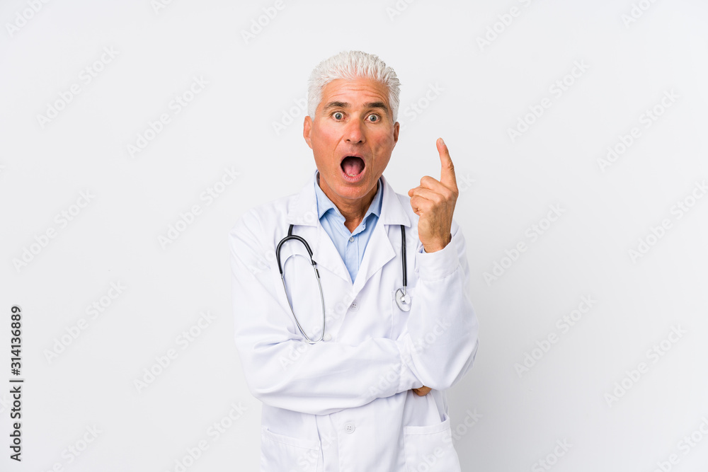 Mature caucasian doctor man having some great idea, concept of creativity. Mature caucasian doctor man having some great idea, concept of creativity.
