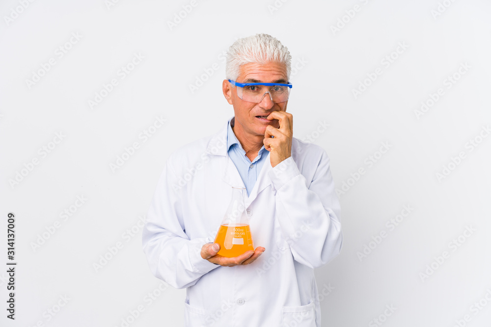 Mature chemical man isolated biting fingernails, nervous and very anxious. Mature chemical man isolated biting fingernails, nervous and very anxious.