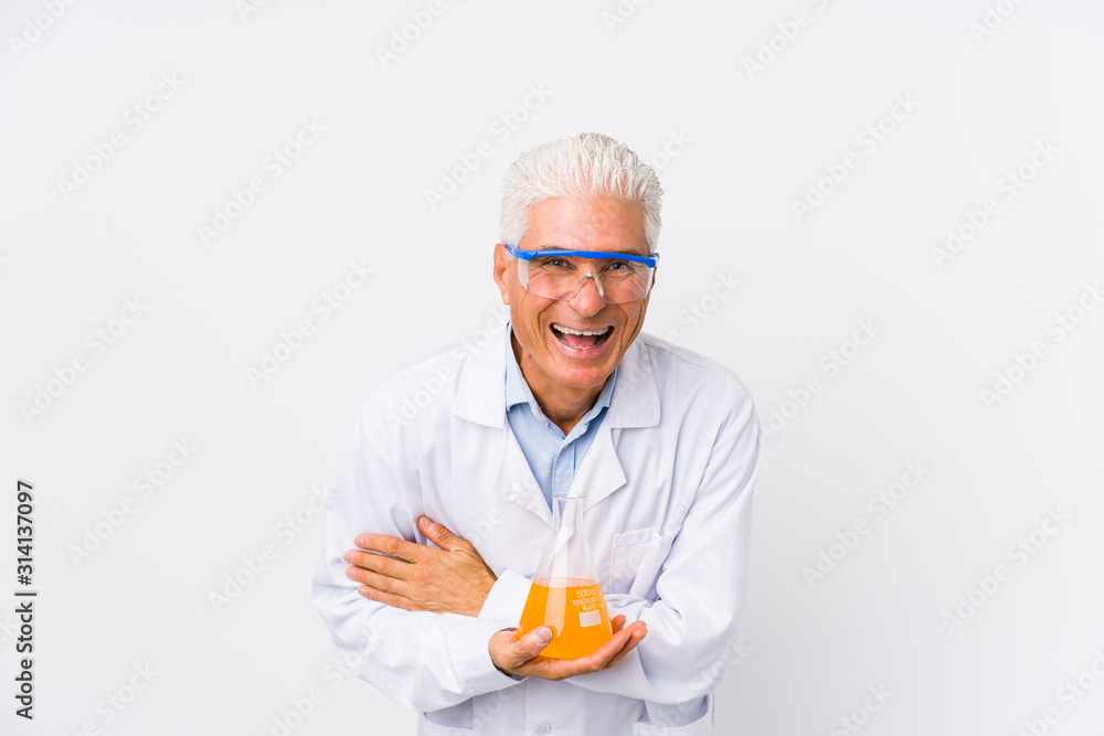 Mature chemical man isolated laughing and having fun.