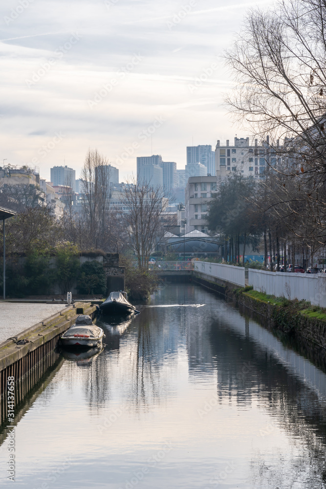 Paris, France - 12 29 2019: Ourcq Canal. Dock of the bottom of Rouvray