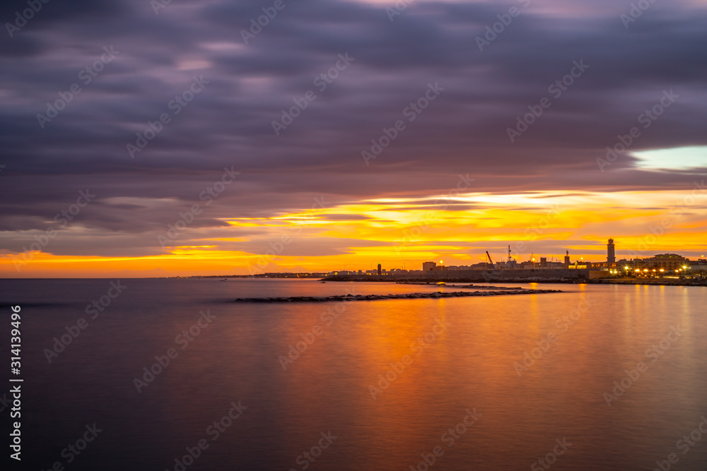 Beautiful sunset on the coast of Bari, Adriatic Sea.