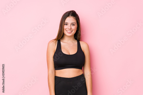 Young fitness caucasian woman isolated happy  smiling and cheerful.