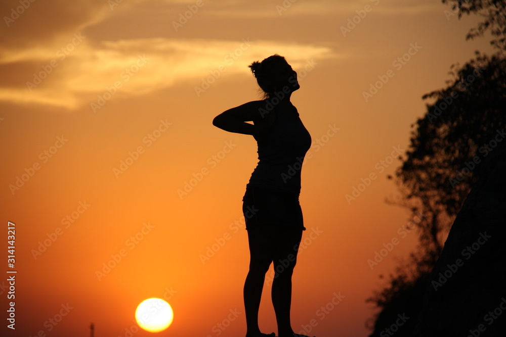 Women enjoying sunset. Cuba.