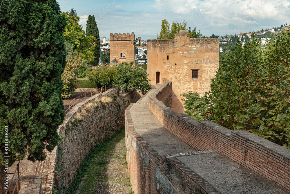 View of corridor along the fortified walls of Alcazaba, citadel of Alhambra, Spain. Strong protection found in this palace in Granada