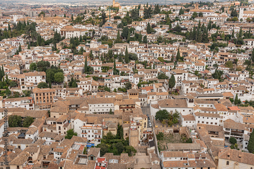 Aerial top view of Granada city in Spain. Houses in the city of Granada in Andalusian neighborhood, Spain