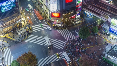 Elevated time lapse of crowds crossing the famous Shibuya Crossing, Shibuya, Tokyo, Japan photo