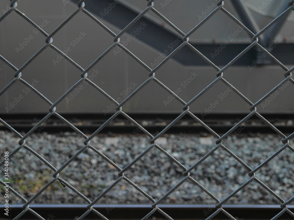 Fototapeta premium fence on a background of blue sky