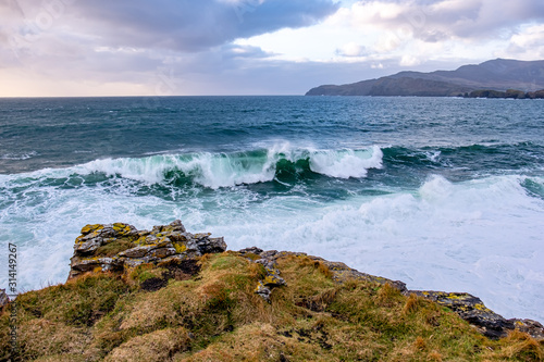 Huge waves breaking at Muckross Head - A small peninsula west of Killybegs, County Donegal, Ireland. The cliff rocks are famous for climbing