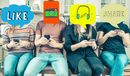People of the millennium generation use smartphones - speech bubbles and symbols of communication in social media. photo