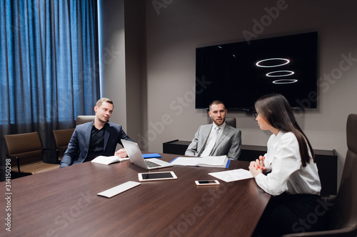 Group of business people having a discussion in conference room