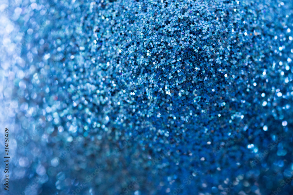 Blue defocused glitter background with bokeh. Macro glitter Blue defocused glitter background with bokeh. Macro glitter