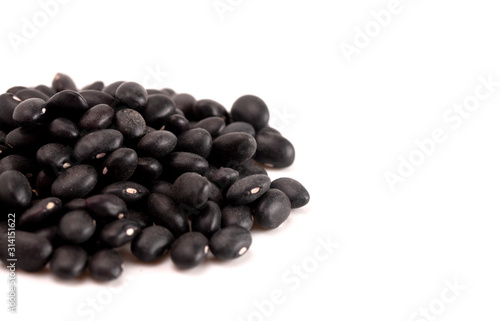 Pile of Dry Black Beans Isolated on a White Background
