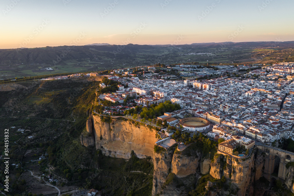 Aerial view of Ronda village, a village with white houses at the edge of cliffside in Andalusia, Spain