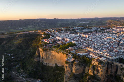 Aerial view of Ronda village, a village with white houses at the edge of cliffside in Andalusia, Spain