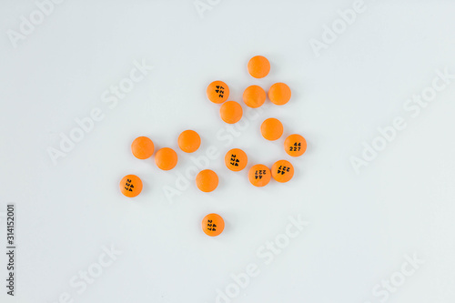 Group of assorted orange prescription pills