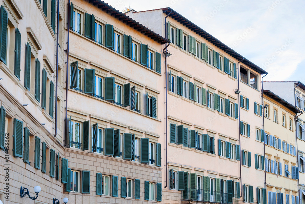 Obraz premium Street with old traditional Italian houses with wooden windows in Florence, Italy