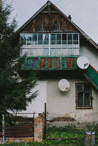 Tatariv, Carpathians/Ukraine - October 2019: Traditional Ukrainian house in the Carpathian Mountains photo