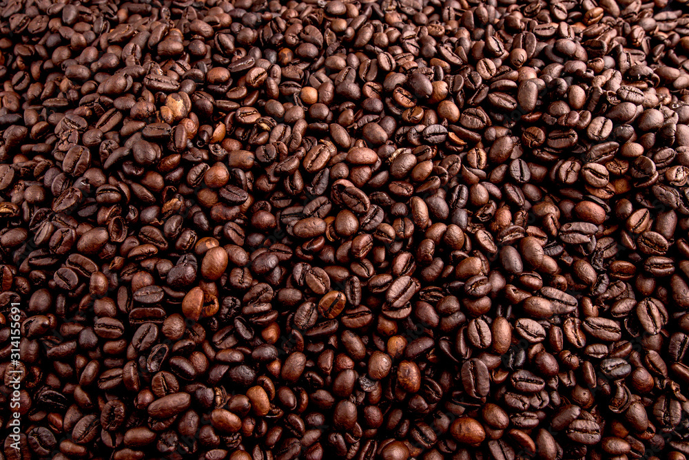Roasted coffee beans with background. Roasted coffee beans with background.