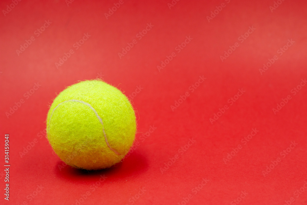Tennis is on red background