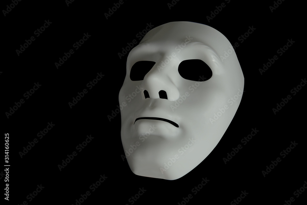 White mask in different light and perspectives.