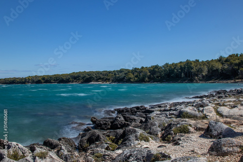 Rocky coastline with clear blue water