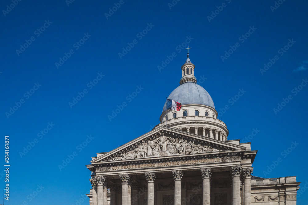 Dome of Pantheon under blue sky in Paris, France
