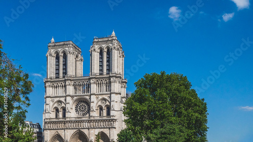 Notre Dame Cathedral under blue sky, in Paris, France