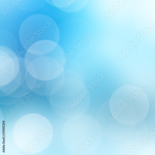 Blue bokeh lights abstract background. Bokeh on the background blurred the natural blue and white.