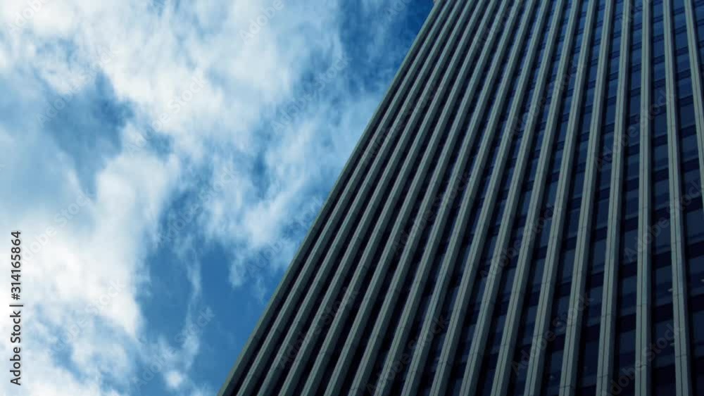 Skyscraper Building With Clouds Above Skyscraper Building With Clouds Above