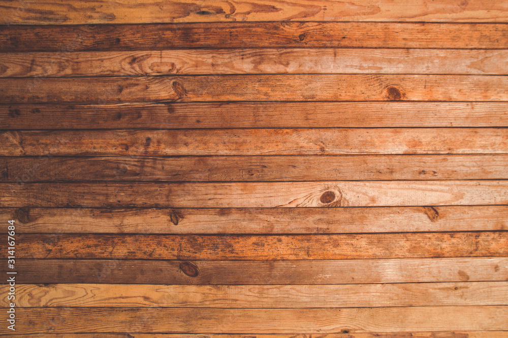 Obraz premium Old wooden plank board wall / floor. House reparation, housework exterior and interior design wallpaper, background in faded light retro hipster colors.