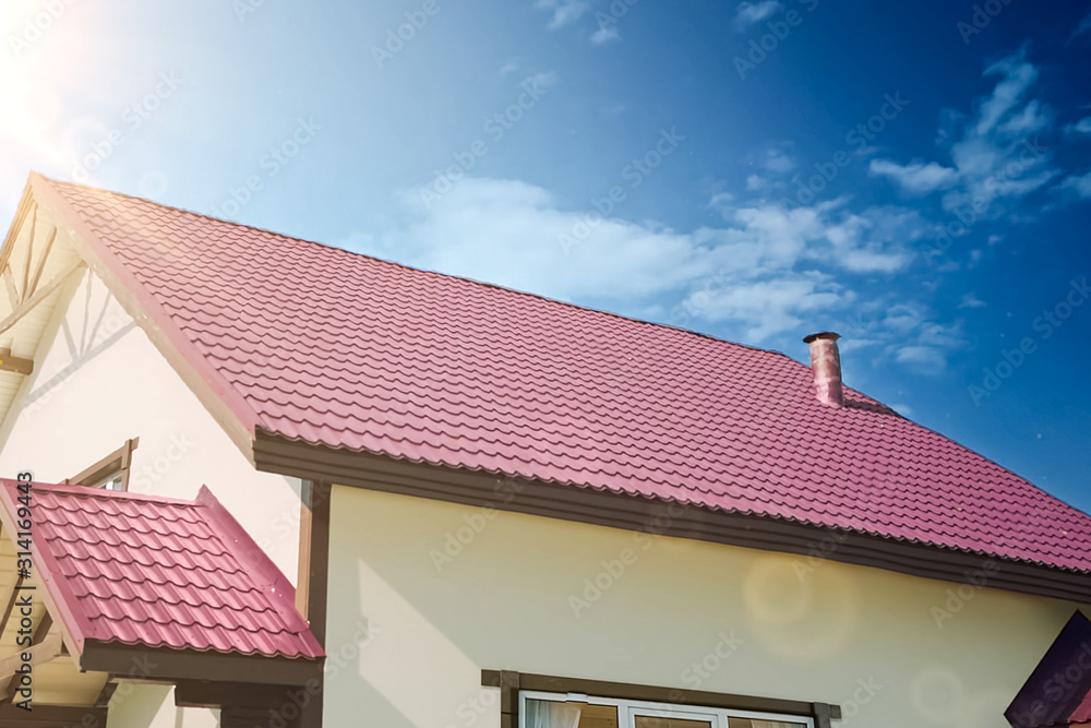 Sun rays over the roof of the house. Sun rays over the roof of the house.