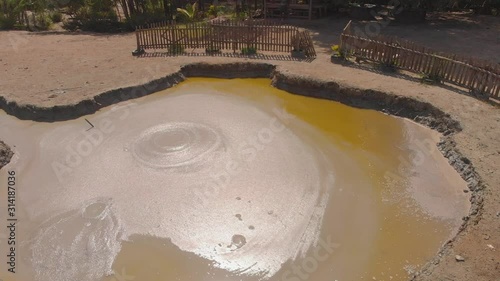 Bubbling therapuetic mud volcano L'eau Michel located in the southern village of Penal, Trinidad photo