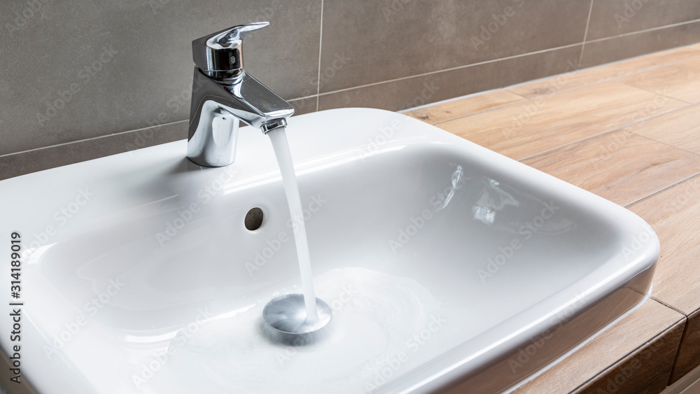 faucet with running water in bathroom faucet with running water in bathroom