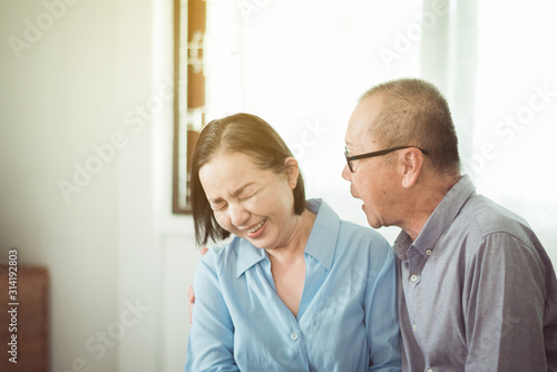 Happy asian senior couples encourage and hugging in bedroom together,Happy and smiling,Positive thinking,Adult social care concept